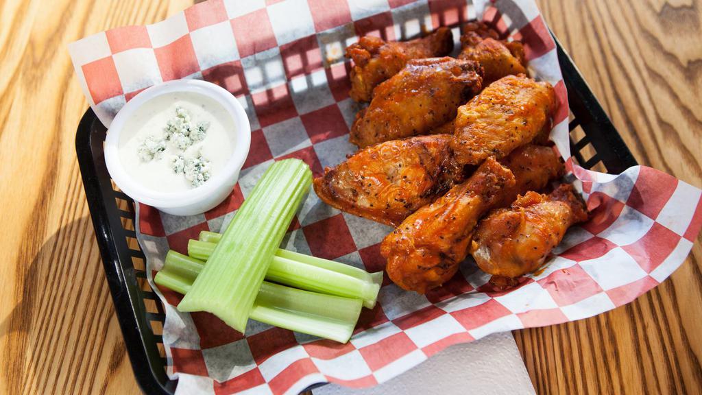 Buffalo Wings · Smoked and deep fried.  Tossed in our buffalo hot sauce.  Served with celery