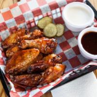 Smoked Bbq Wings · Smoked and deep fried.  Tossed in our competition bbq glaze.  Served with celery