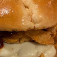 Z-Man Burger · Smoked provolone, onion rings, Joe’s BBQ sauce, toasted brioche bun. Add cheese for an upcha...