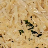 Fettucine Alfredo · Aged parmesan, parsley.