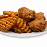 2 Piece Tenders With Waffle Fries · Breaded chicken tenders with waffle fries