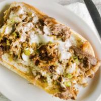 Philly Steak Sandwich · A sandwich so good, we have Philly screaming for it. Made with grilled steak, onions and pep...