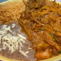 Fajitas · Choice of meat (steak, chicken, shrimp) with a side of rice and beans.