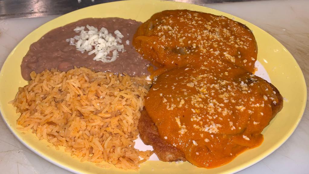 Chile Relleno Dinner · 2 chile rellenos, rice and beans.