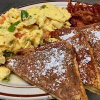 French Toast Scramble · 2 French Toast,  2 scrambled eggs, 2 Bacon, 2 sausage!
1 syrup and 2 butters included.