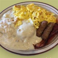Biscuit Scramble · 2 Biscuits in Gravy, 2 Scrambled eggs, 2 Bacon, 2 Sausage!