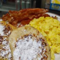 French Biscuit Scramble  · 2 Biscuits dipped in a french toast mixture and grilled till  crispy . 
1 syrup and 2 butter...