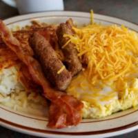B10-Farmers Scramble · 2 eggs Scrambled with bell peppers and onions.  With  gravy and cheese added to the top.
com...