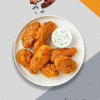 Mango Tango Habanero Wings · Freshly grilled chicken wings, tossed in mango habanero sauce. Served with a side of ranch o...