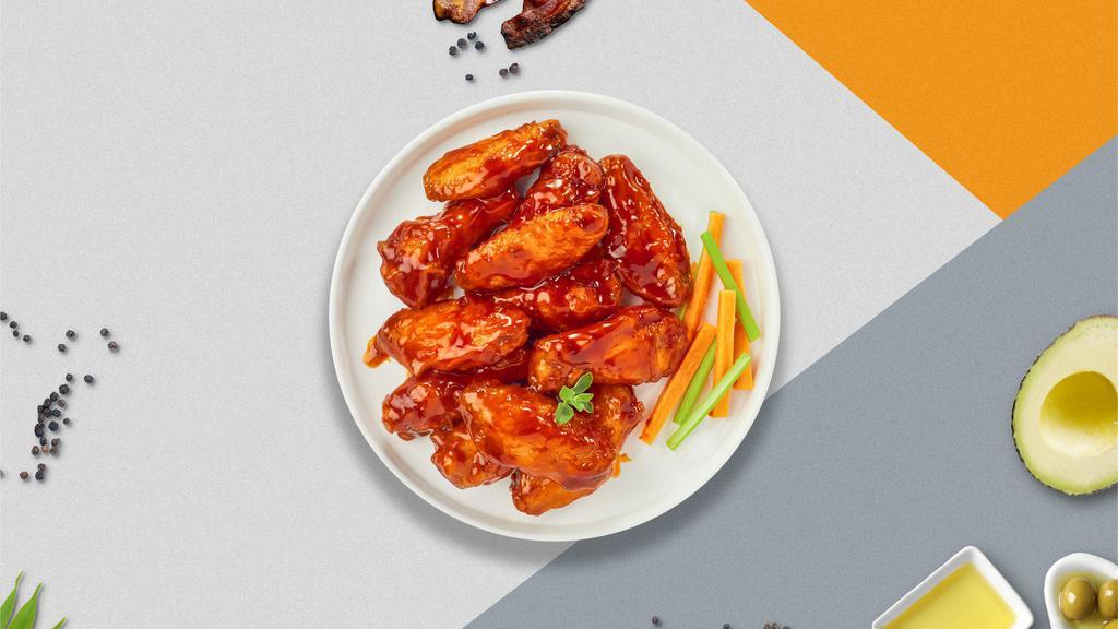 Chronicles Of Sriracha Chicken Wings · Freshly grilled chicken wings, tossed in a spicy honey sriracha sauce. Served with a side of ranch or bleu cheese.