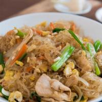 Pad Woon Sen · Stir-fried clear noodle with egg, cabbage, celery, carrot, green onion, and in a light brown...