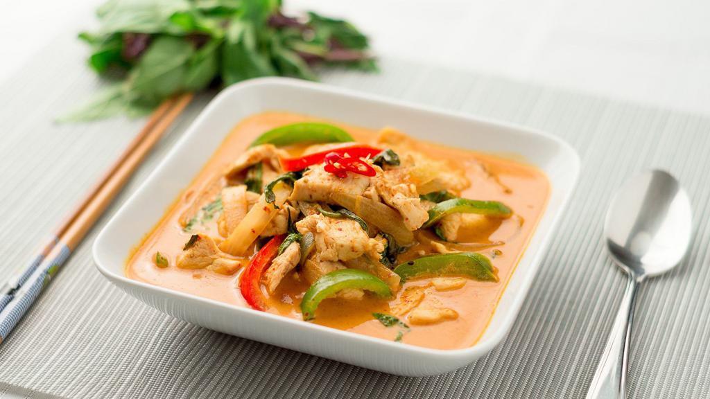 Red Curry · Red curry paste with coconut milk, basil, and bamboo shoots. Spicy.