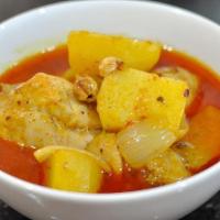 Masaman Curry · Massamun curry paste with coconut milk, peanut, and potatoes. Spicy.
