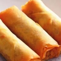 Crispy Egg Roll (3) · Fried homemade egg roll stuffed with cabbage, clear noodles, carrot, and celery served with ...