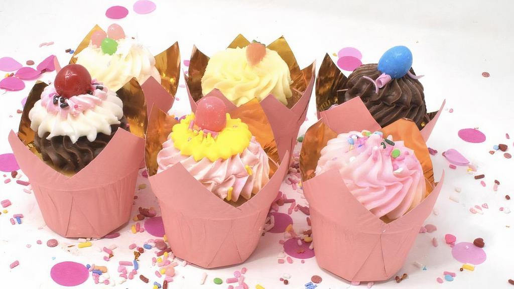 Six Cupcakes · What Pinkitzel is famous for! Beautiful and cute moist cupcakes that taste as lovely as they look!