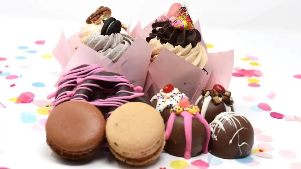 Chocolate Sampler · A special assortment of our best selling handmade chocolate items! Includes four assorted gourmet chocolate cupcakes, four assorted truffles, two chocolate dipped pretzels, and two chocolate french macarons!