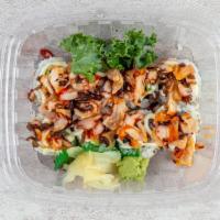 Octo Tako · Octopus on top of salmon roll with avocado and mayo.