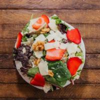 Strawberry Field (Small) · Baby field greens, romaine, chopped walnuts, shaved Parmesan and Reggiano and sliced fresh s...