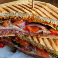 Italian Sandwich · Ham, pepperoni, tomato, onion, mozzarella, lettuce & banana peppers on focaccia bread.
