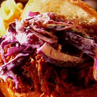 Bbq Pork Sandwich · Shredded BBQ pork, grilled onions, melted cheese, pickles, coleslaw on a ciabatta roll.