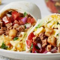 Chorizo Breakfast Burrito  · Burrito with chorizo, eggs, cheese, avocado, tater tots, pico de gallo & salsa served with h...