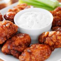 Boneless Chicken Wings (8) · 8 wings served with ranch dressing. Choose your sauce: BBQ, buffalo or garlic parmesan & cho...