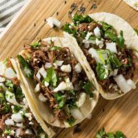 Street Tacos (3) · Carnitas or barbacoa (shredded beef) corn tortilla, onion, cilantro, salsa, queso fresco wit...