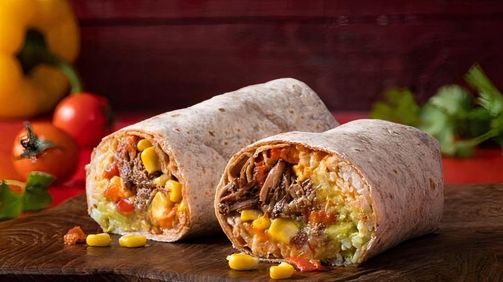 Loaded Burrito · Choice of chicken, beef or pork, rice, black beans, pico de gallo,  salsa, sour cream, cheese & side of chips.