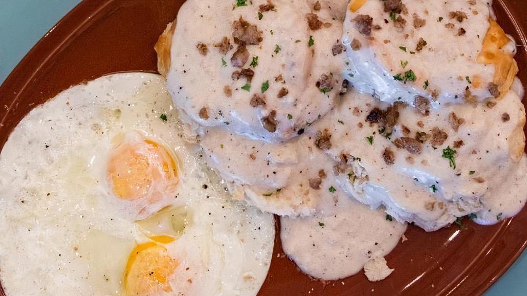 Biscuits & Gravy · Flaky Buttermilk Biscuits &Sausage Skillet Gravy Served alongside 2 Eggs your way (Black Pepper Cream Gravy Available)