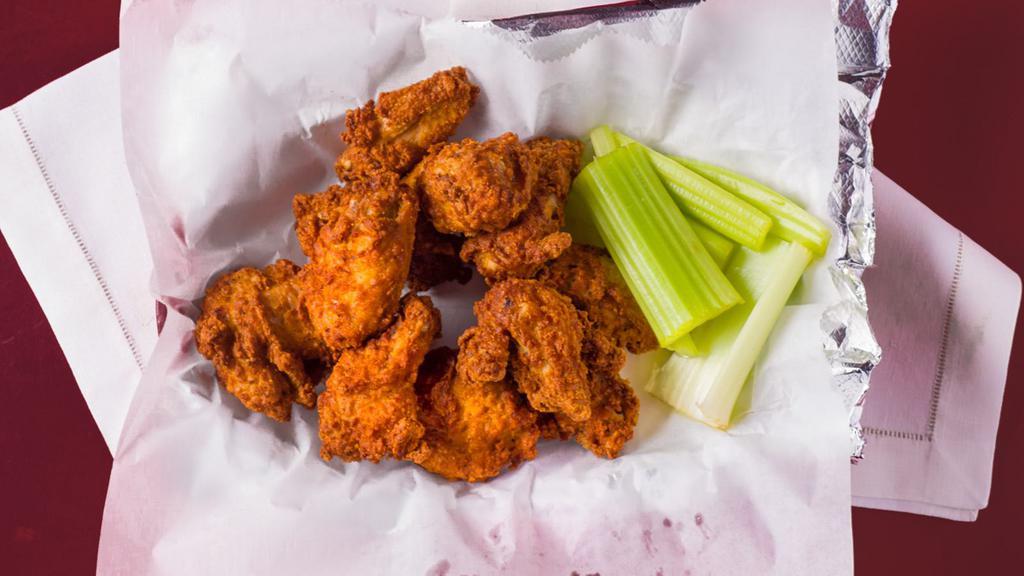 Rhino Wings · Your choice of, naked, boneless or buffalo served with your choice of dipping sauce. Hot, mild, or bbq.