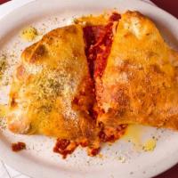 Build Your Own Calzone · Cheese plus one topping.
