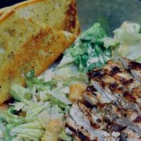 Chicken Caesar Salad · Grilled or fried chicken, romaine lettuce, Caesar dressing, Parmesan cheese and croutons. Se...