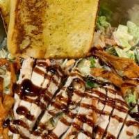 Bbq Chicken Salad · Salad mix with roasted corn, carrots, Cajun tortilla strips, tomato, shredded cheddar cheese...