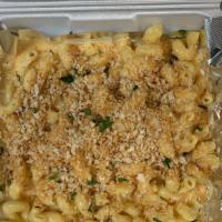 Baked Mac & Cheese · Topped with seasoned breadcrumbs and baked to perfection.