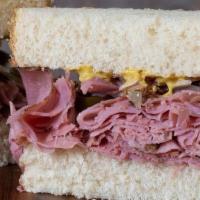 Taxi Driver · Double portion of pastrami, pepper jack, sautéed onions, grilled jalapenos, spicy mustard, o...
