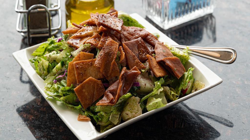 Fattoush · A blend of vegetables mixed with toasted pita bread.