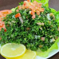 Tabbouli · Parsley, tomatoes, green onions and cracked wheat.