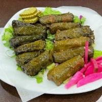 Vegetable Grape Leaves · Stuffed with rice and vegetables, served with rice.