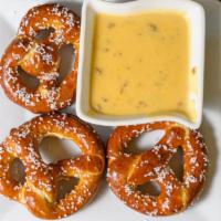 Beer Cheese & Bavarian Pretzels · Cornerstone Kolsch & cheddar cheese fondue, spicy mustard, three braided pretzels