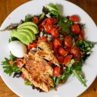 Classic Cobb  · Baby greens, grilled chicken, tomato, avocado, blue cheese crumbles, crispy bacon, hard-boil...