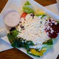 Greek Salad · Romaine lettuce, tomatoes, feta cheese, beets, Kalamata olives, onions, pepperoncini and Gre...