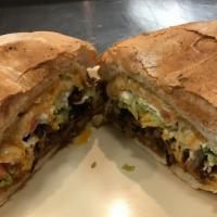 Al Pastor Torta · Marinated Pork. Tortas come with lettuce, tomato, cheese, sour cream and beans