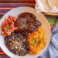 Mole Poblano Plate · Grilled chicken lathered with our savory mole sauce. Served with Mexican rice, black beans, ...