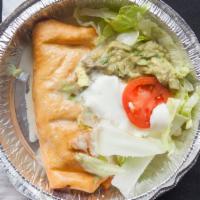 Chimichanga Supreme · Two soft or deep-fried burritos, with cheese sauce on top. Served with Mexican rice or refri...
