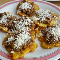 Tostitostones · Six tostones with your choice of meat.