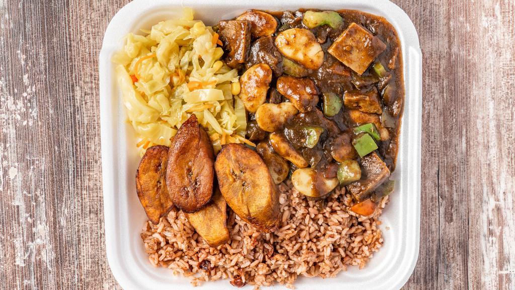 Veggie Ox Bowl · Impossible plant base protein with butter beans, rice & beans, sauteed mixed vegetable and fried plantain.