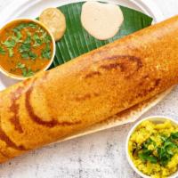 Masala Dosa · A fermented crepe made from lentils and rice stuffed with special potato masala.