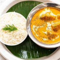 Butter Chicken · Chunks of chicken grilled in a clay oven and then cooked in a light creamy tomato sauce and ...