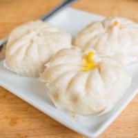 Salapao (Bbq Pork, Basil Pork, Panang Beef,Red Bean) · White steamed buns with your choice of filling.
