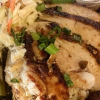 Bayou Chicken · Grilled Cajun seasoned chicken breast topped with creole vegetables, green onions, melted ch...